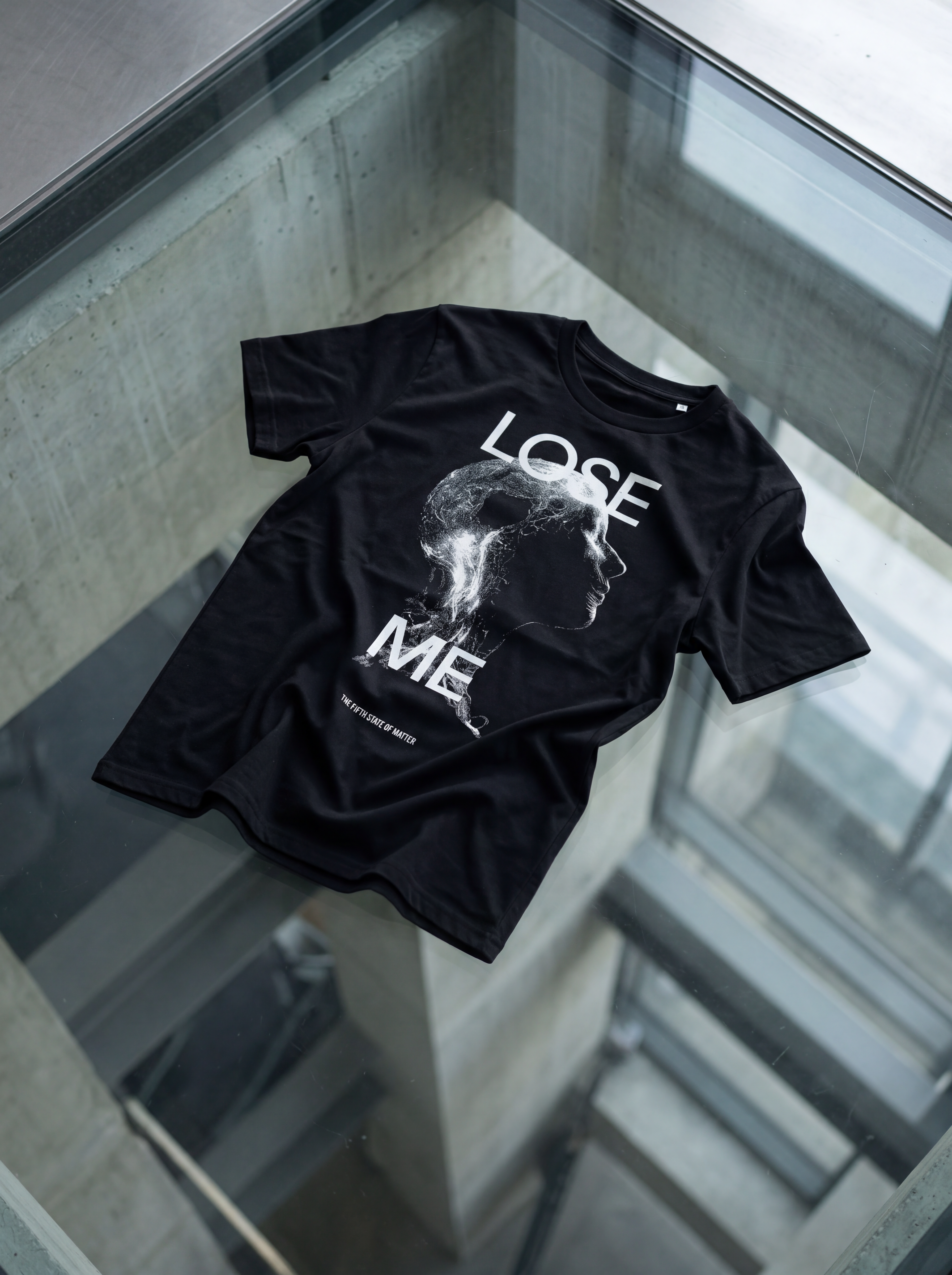 LOSE ME tee from The Fifth State of Matter series — front print close view in hard light